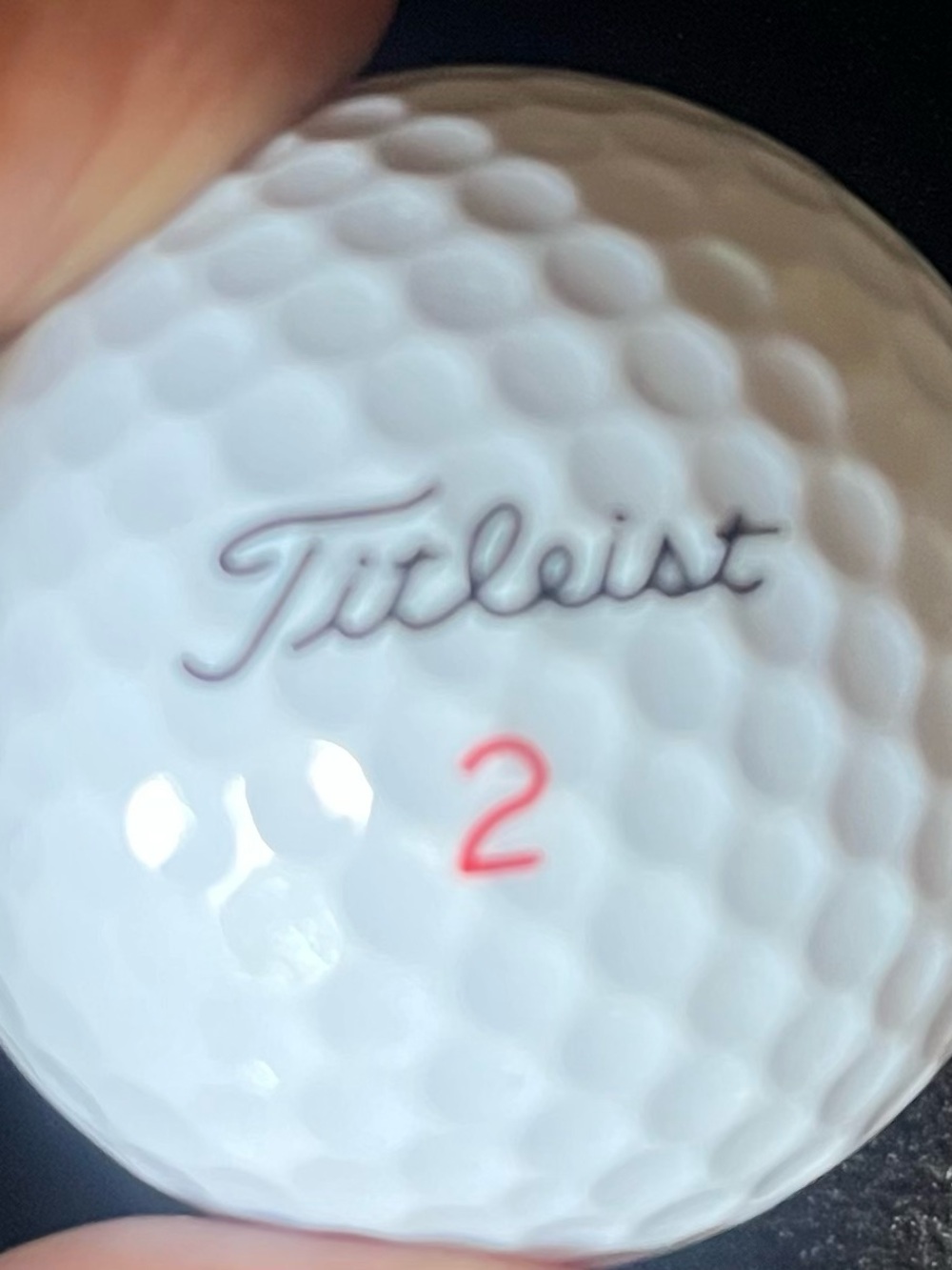 4 Golf ball’s by Titleist white.